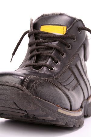 Left man's winter leather a boot of black color on a white background, (look similar images in my portfolio)の写真素材