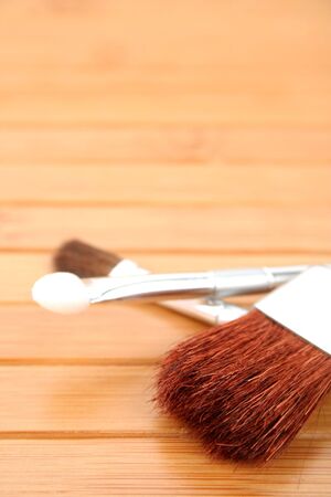 makeup brushes on wooden carpet 3の写真素材