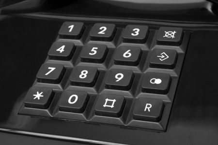 Push-button dial of phone of black color, isolatedの写真素材