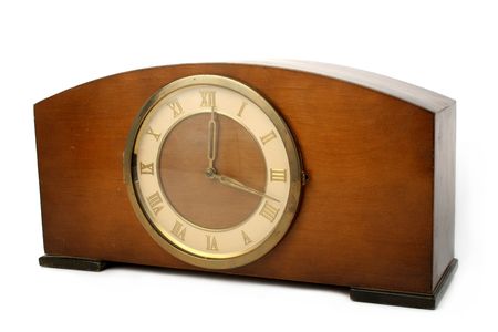 Ancient clocks made of a tree, isolatedの写真素材