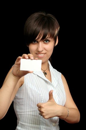 girl with paper for text, isolated on blackの写真素材