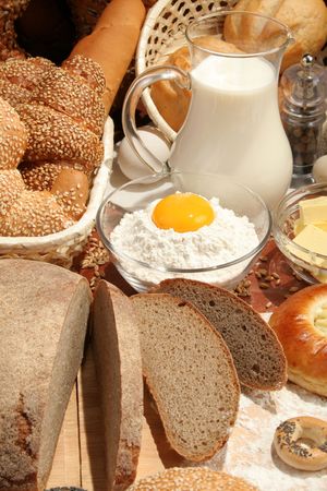 Bread, flour, milk, butter, eggs, backgroundの写真素材
