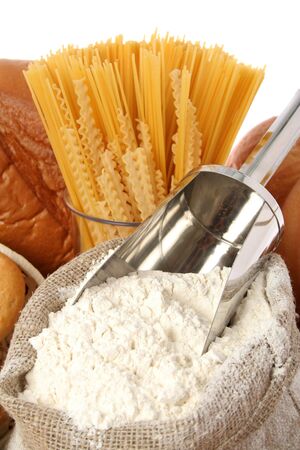 Bag with a flour and macaroni, isolated on whiteの写真素材