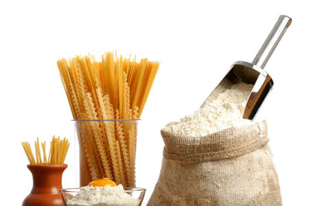 Bag with a flour and macaroni, isoleted on whiteの写真素材