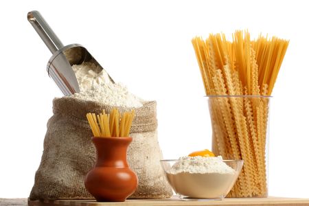 Bag with a flour and macaroni, isoleted on whiteの写真素材