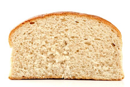 Slised loaf of fresh bread, isolated on whiteの写真素材