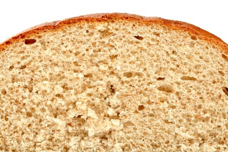 Slised loaf of fresh bread, isolated on whiteの写真素材