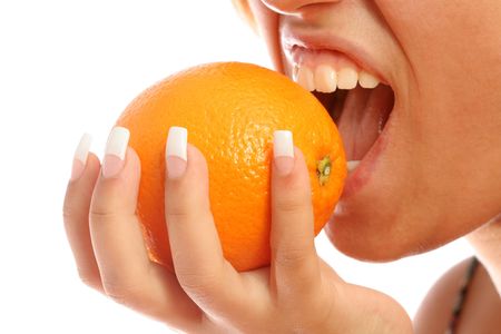 Manicure and orange, isolated on whiteの写真素材