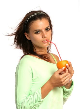 beautiful girl with sliced orange on whiteの写真素材