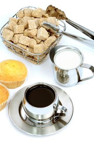 Cup of black coffee with brown sugar, muffin and milk 1の写真素材