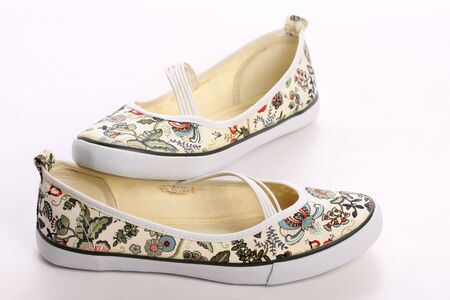 Pair of woman slippers, on whiteの写真素材