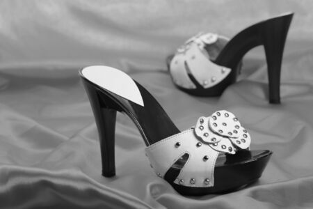 New woman shoes on satinの写真素材