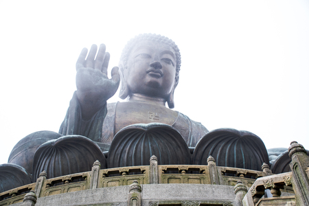 The enormous Tian Tan Buddha statue in the cloud at high mountain near Po Lin Monastery, Lantau Island, Hong Kong.のeditorial素材