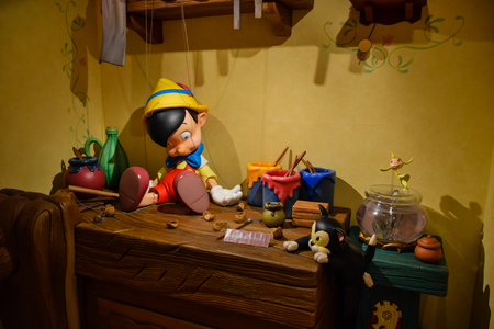 TOKYO, JAPAN - MAY, 2016: Geppetto's house with Pinocchio on the table setup in Disneystore located at Shibuya, Tokyoのeditorial素材