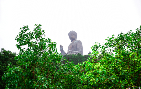 HONG KONG: Enormous Tian Tan Buddha statue on top of hill at Ngong Ping, Lantau Island, in Hong Kongのeditorial素材