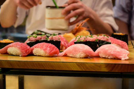 Japanese chef serving Japanese food style set of Sushi in a restaurantのeditorial素材