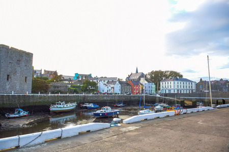 Yacht docking at canal in a nice small port in a clear blue sky day in a small town of Douglas, Isle of Man.のeditorial素材