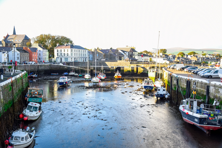 Yacht docking at canal in a nice small port in a clear blue sky day in a small town of Douglas, Isle of Man.のeditorial素材
