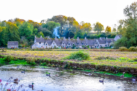 Beautiful old village of Bibury in Cotswold district in Gloucestershire, England, United Kingdomの写真素材