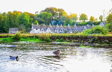 Beautiful old village of Bibury in Cotswold district in Gloucestershire, England, United Kingdomの写真素材