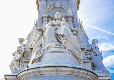 Sculpture of queen Victoria at Victoria Memorial in front of Buckingham Palace located in the city of Westminster, United Kingdomのeditorial素材