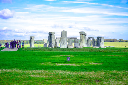 Tourists visiting Stonehenge, a prehistoric stone monument in Salisbury, Wiltshire, England, United Kingdomのeditorial素材