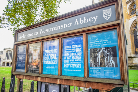 Welcome to Westminster Abbey signage board setting up near the entrance of Westminster Abbey in the city of Westminster, London, England, United Kingdomのeditorial素材
