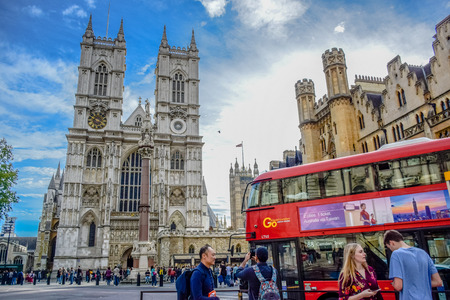 Road in front of Westminster Abbey full of cars, buses and tourists in the city of Westminster, London, England, United Kingdomのeditorial素材