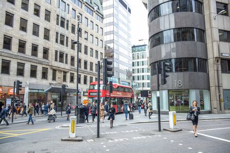 People walking along the street in the city of London, England, United Kingdomのeditorial素材