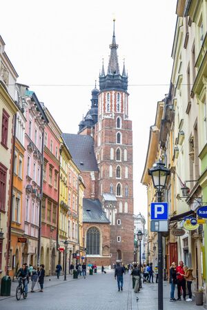 Tourists and Polish people walking through Florianska street, the main streets in Krakow Old Town and one of the most famous streets of Krakow, Polandのeditorial素材
