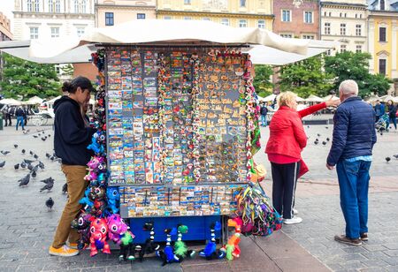 Souvenir shop kiosk selling souvenirs for tourists located at main market town square in Krakow old town, the most famous tourist destination in Polandのeditorial素材
