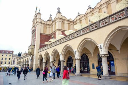 Tourists enjoying their time at Krakow Cloth Hall, the central feature of main market square in the Krakow Old Town, Polandのeditorial素材