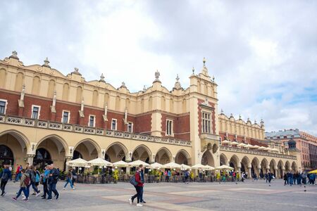 Tourists enjoying their time at Krakow Cloth Hall, the central feature of main market square in the Krakow Old Town, Polandのeditorial素材