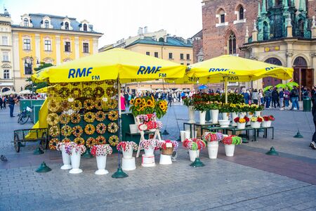 Flower shop selling for tourists located at the center of Main Town Square in the Krakow Old Town area, Polandのeditorial素材