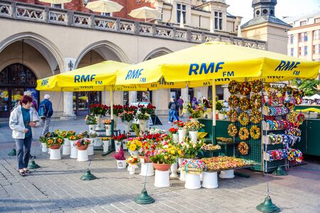 Flower shop selling for tourists located at the center of Main Town Square in the Krakow Old Town area, Polandのeditorial素材