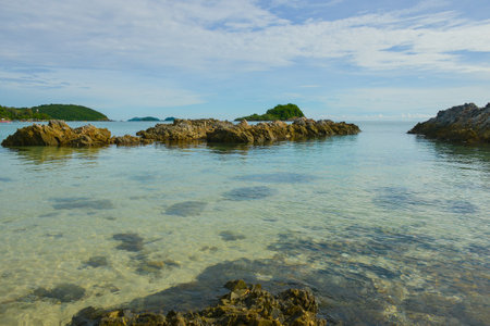 Beautiful crystal clear sea water of Thailand rocky seashore beach at Sattahip district of Chonburi provinceの写真素材