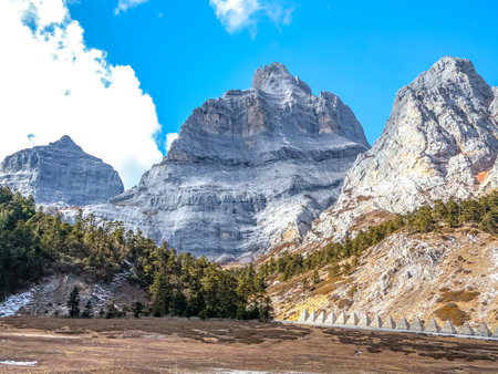Summit Peak located in Grand Canyon National Scenic Area of Diqing in Shangri-La County of Yunnan, Chinaの写真素材