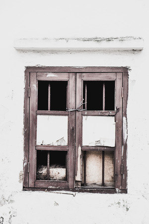 Old abandon Wood Windows in Antique Windows and Frame white concrete wall backgroundの写真素材