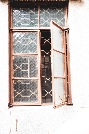 old vintage window of house old fashion design classic on rustic painted concrete wall backgroundの写真素材