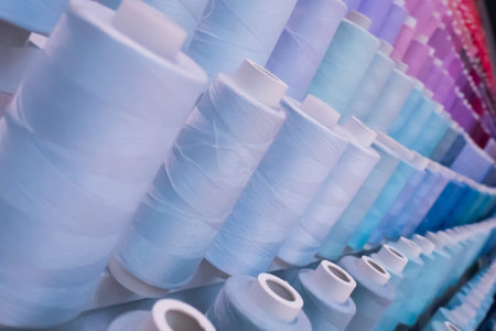 Colourful thread in rows business factory concept idea  background