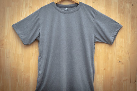 gray short sleeve t-shirt plain round neck mock up concept idea wooden back ground  front view