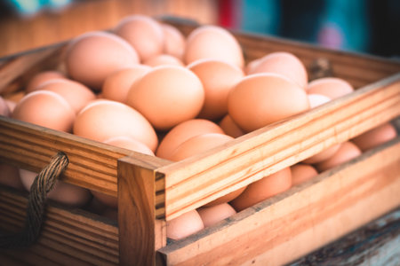 Fresh farm egg in wooden box.nature healthy concept idea