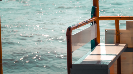seat on shutter boat over ocean sea to pier island.の写真素材