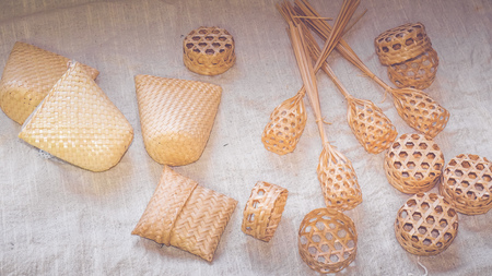 Set of Empty wicker basket on the table with a background in natural linen,Template mock up for display of productの写真素材