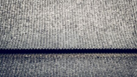 The Chinese Roof Tiles with Curve Design. The clay roof of a Japanese temple. material of traditional Asian architecture pattern texture backgroundの写真素材