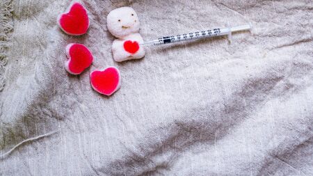 Broken heart. Stitch suture on heart shape. Love and health care concept. take care heart ideaの写真素材