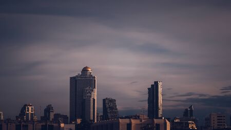 Aerial view of Bangkok modern office highrise buildings, condominium in Bangkok city downtown with sunset sky , Bangkok , Thailandの写真素材