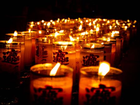 Chinese lanterns religion traditional frame of candle decoration arrange over dark spaceの写真素材