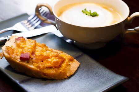 Close up of mushroom soup in white ceramic cup on table top Breakfast Healthy ideaの写真素材