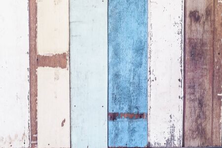 Vintage wood background with peeling paint. Vintage beach wood background - Old weathered wooden plank paintedの写真素材
